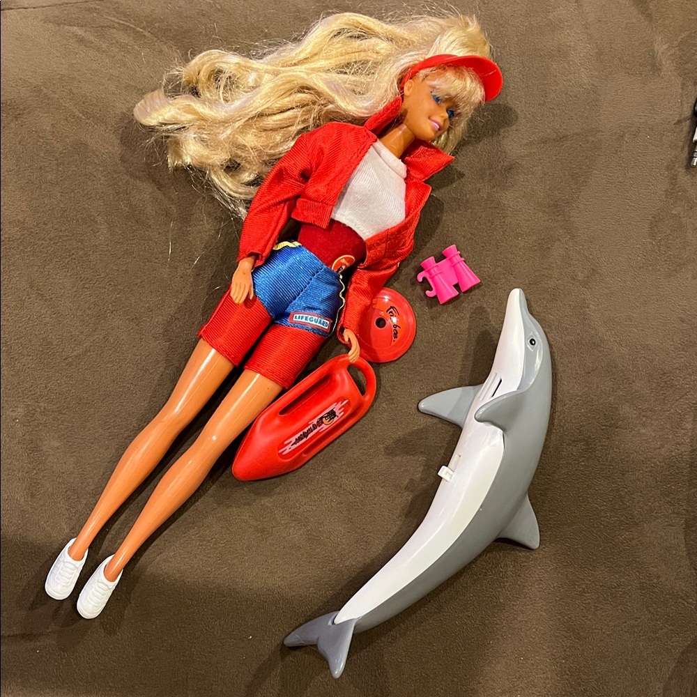 Baywatch Barbie Lifeguard doll and dolphin